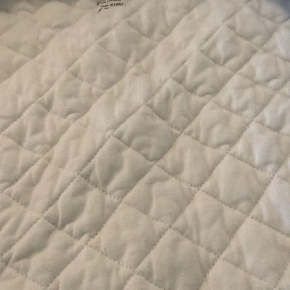 Puppypaws Baby Sleep Sack  transitional swaddle with arms-length sleeves.